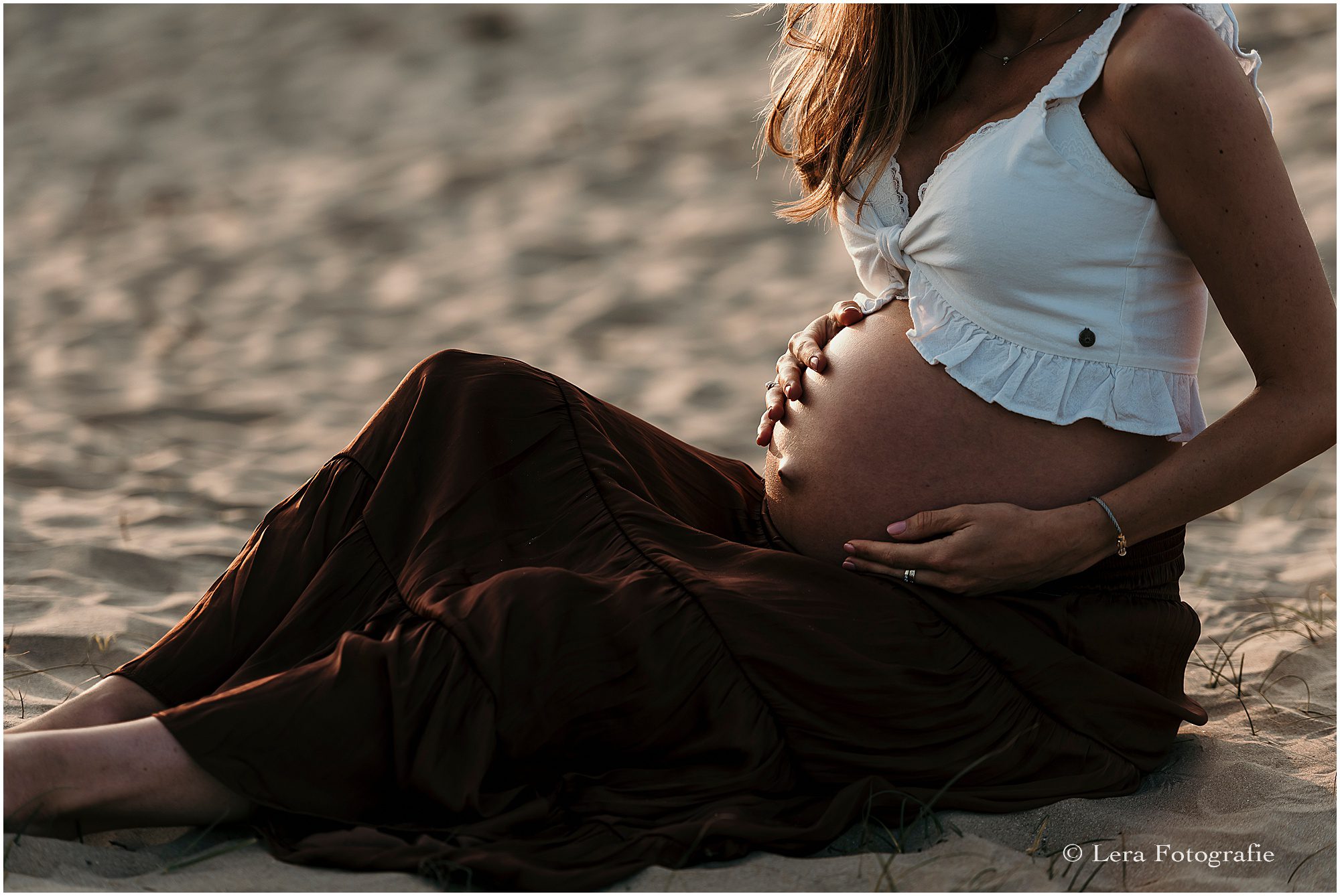 baby op komst fotoshoot van de zwangerschap